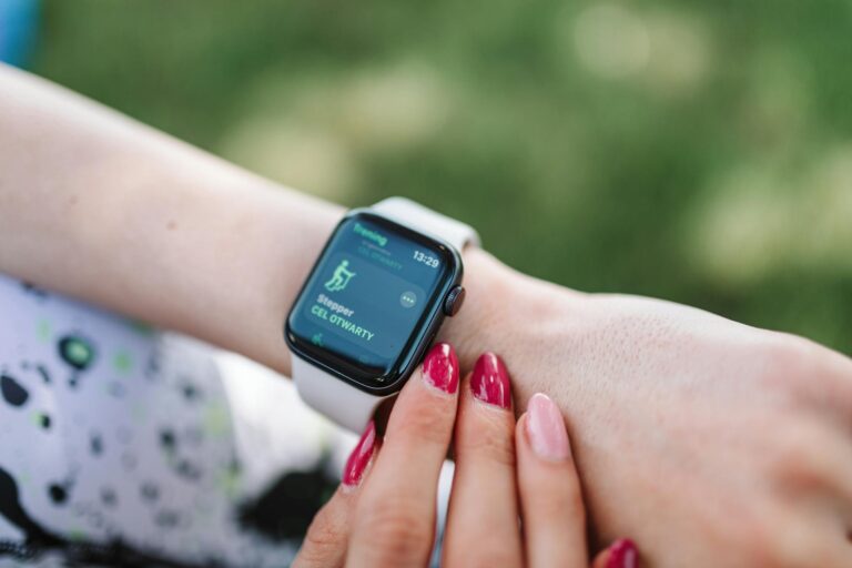 How Smartwatch Blood Pressure Monitoring Finally Achieved Medical-Grade Accuracy Person wearing smartwatch on wrist showing health monitoring display