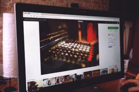 Why Adobe Creative Suite Is Moving to Browser-Based Subscription Models Computer monitor displaying design software interface with creative tools