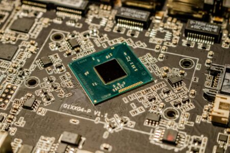 How AMD’s New Desktop Processors Are Finally Beating Intel in Single-Core Performance Close-up view of a modern desktop computer processor showing detailed circuitry and pins
