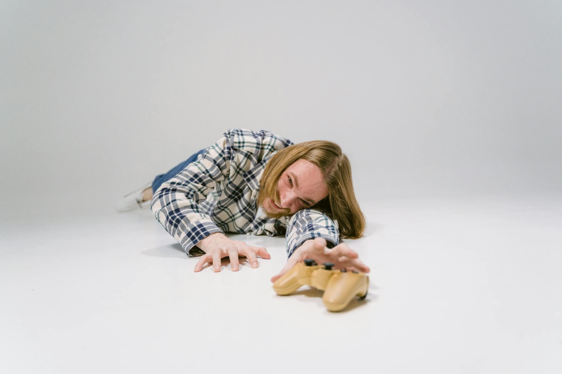 Modern game development studio with multiple computer screens and development workstations