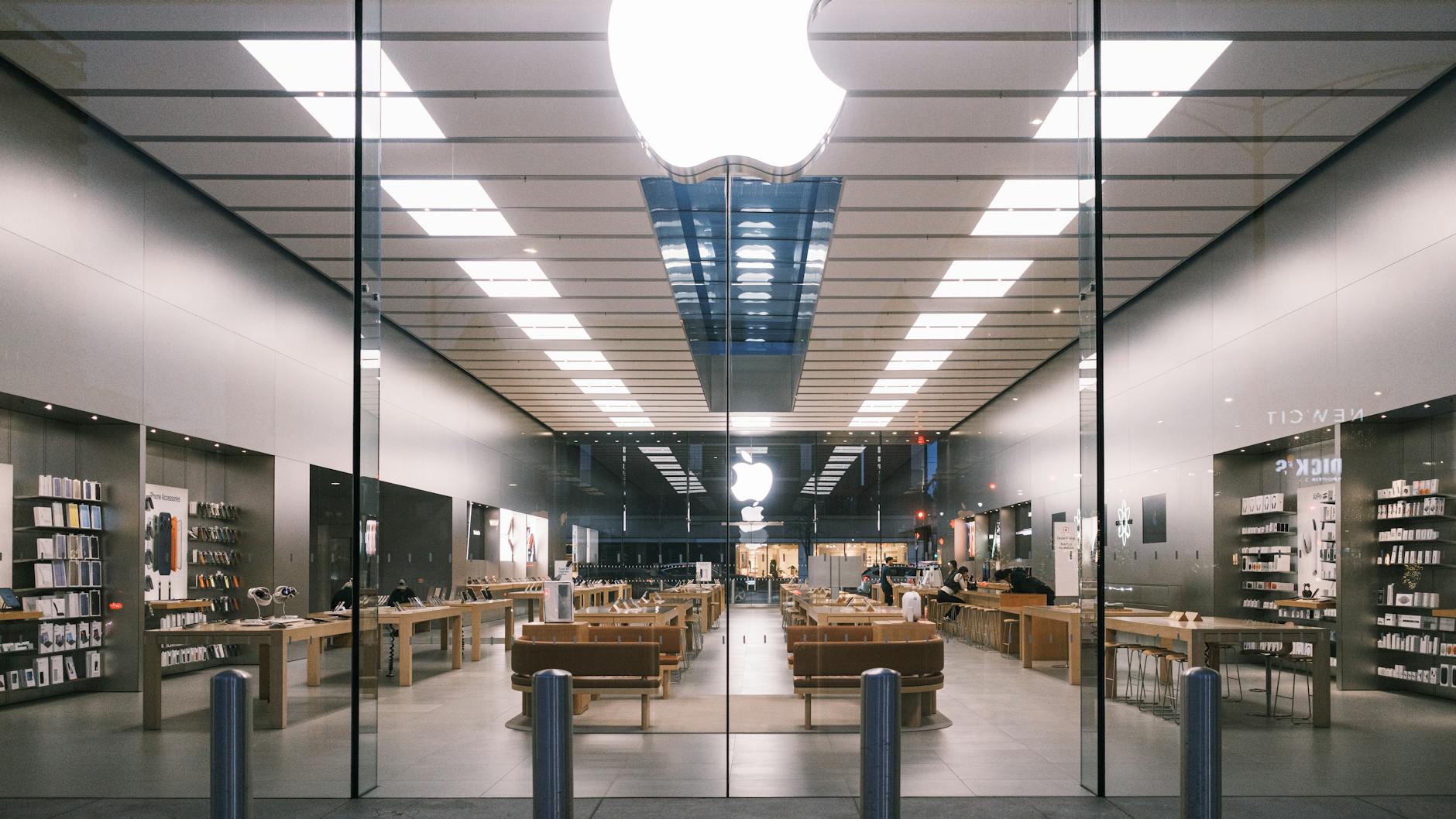 Gaming electronics displayed on retail store shelves with price tags