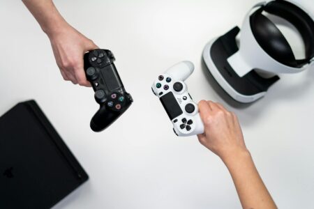 Handheld Fighting Game Controllers Are Finally Getting Analog Triggers Close-up of a handheld gaming controller with trigger buttons visible