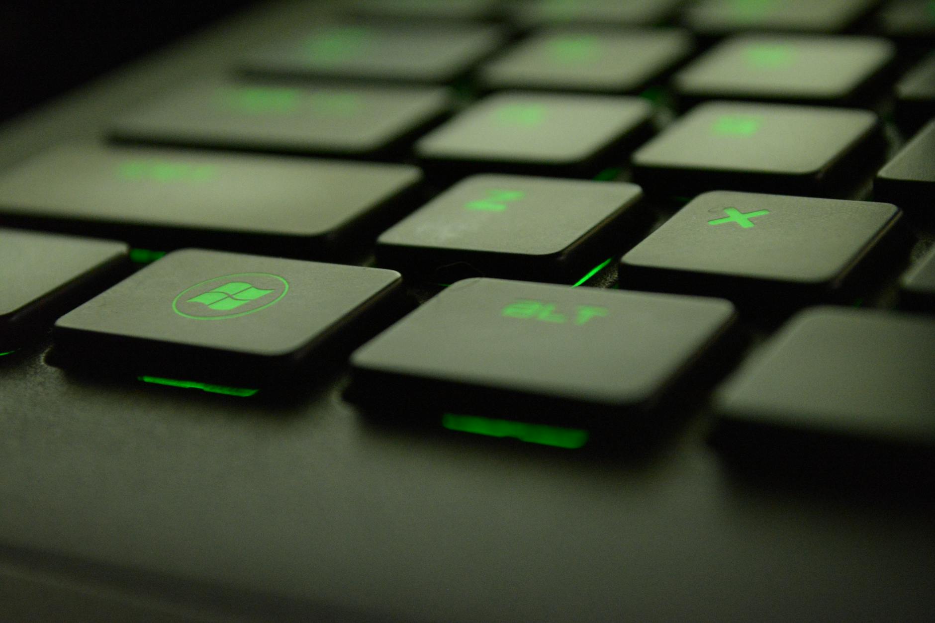 Close-up of a gaming keyboard illuminated during an active gaming session