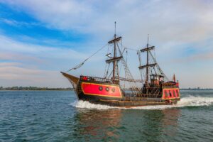 Ubisoft’s Assassin’s Creed Shadows Slump Is Reviving Black Flag Sales A tall ship sailing on open ocean, evoking the pirate setting of Assassin's Creed Black Flag