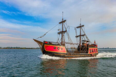 Ubisoft’s Assassin’s Creed Shadows Slump Is Reviving Black Flag Sales A tall ship sailing on open ocean, evoking the pirate setting of Assassin's Creed Black Flag