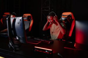 Ubisoft’s Rainbow Six Siege X Overhaul Is Splitting Its Veteran Base A gaming setup with multiple monitors showing a tactical shooter interface