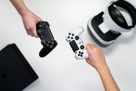 A game controller resting on a desk representing player frustration with game updates