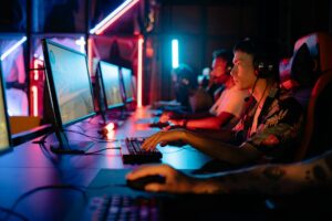 Competitive gamer focused on screen during ranked match