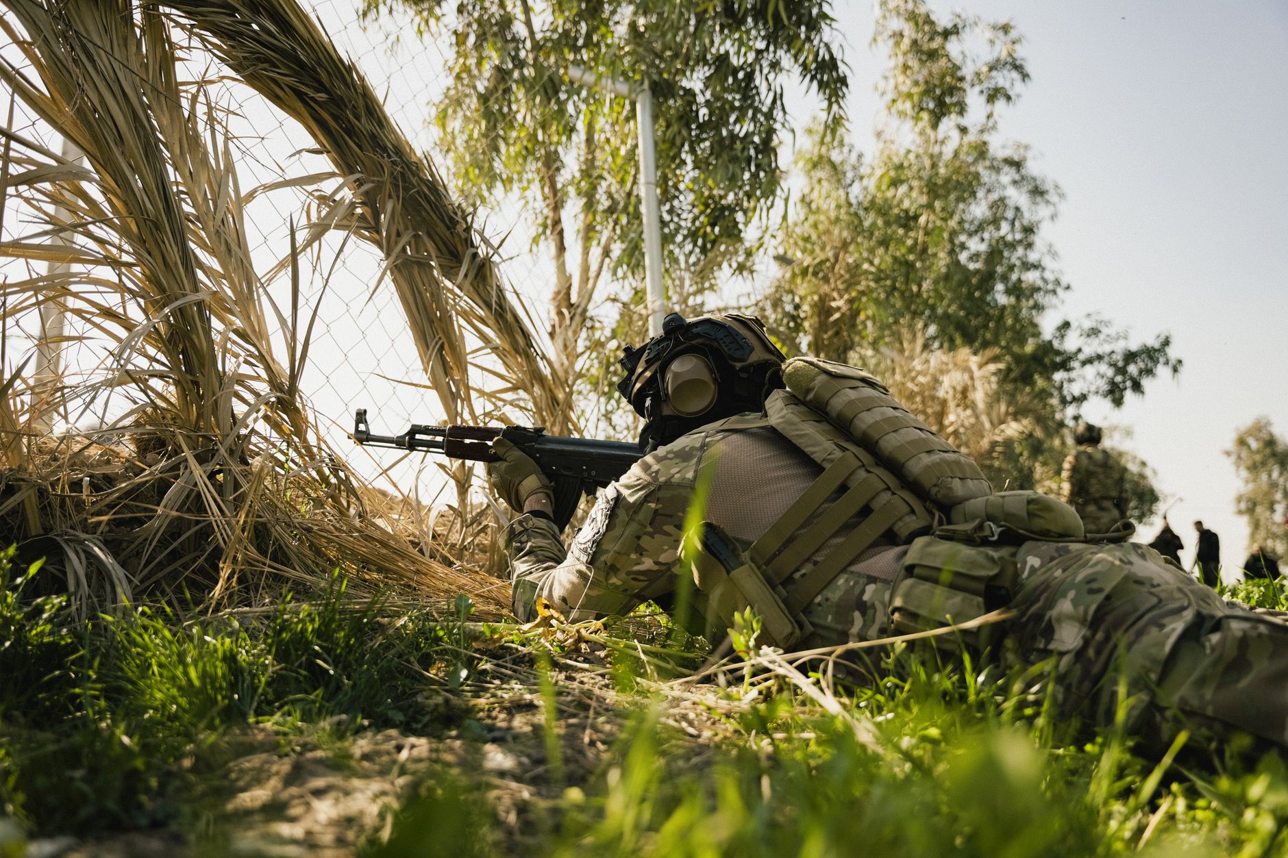 Player in tactical military gear, evoking the mil-sim aesthetic of Delta Force
