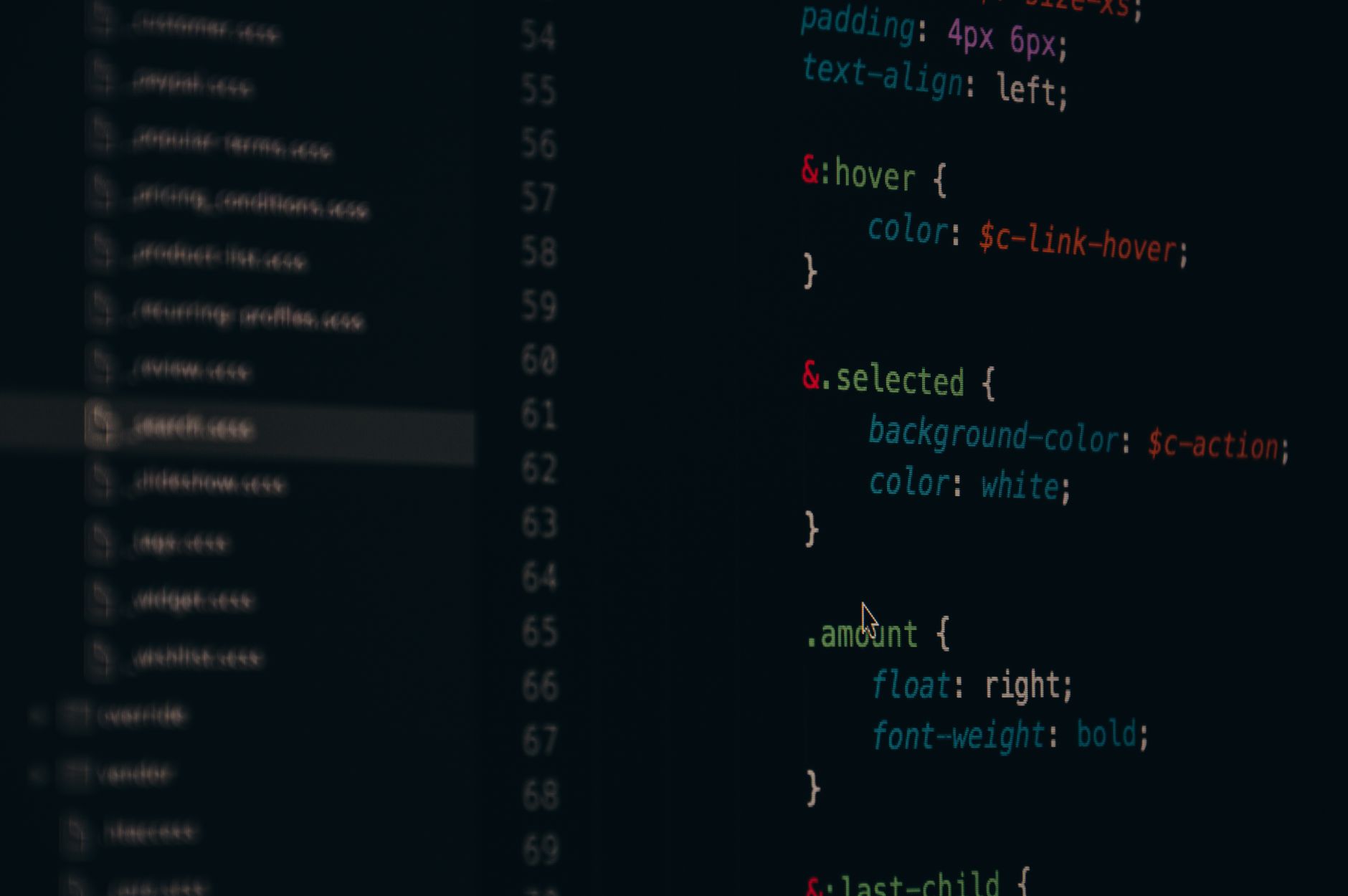 Developer working on code on a computer monitor, representing game modding and software tools