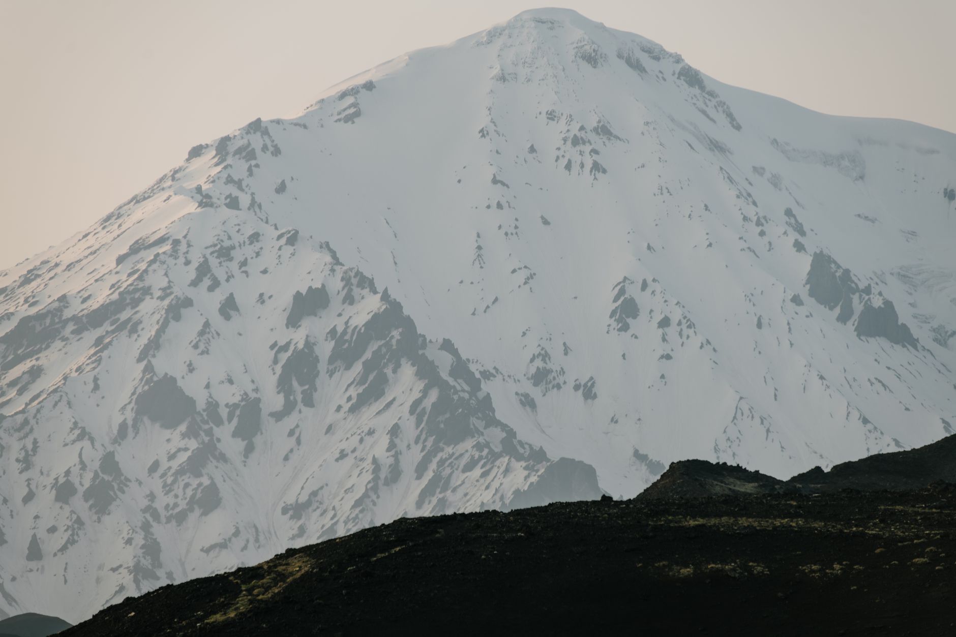 Snow-covered volcanic mountain landscape similar to Mount Yotei in Hokkaido Japan