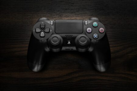 A game controller resting on a dark surface representing Xbox gaming culture