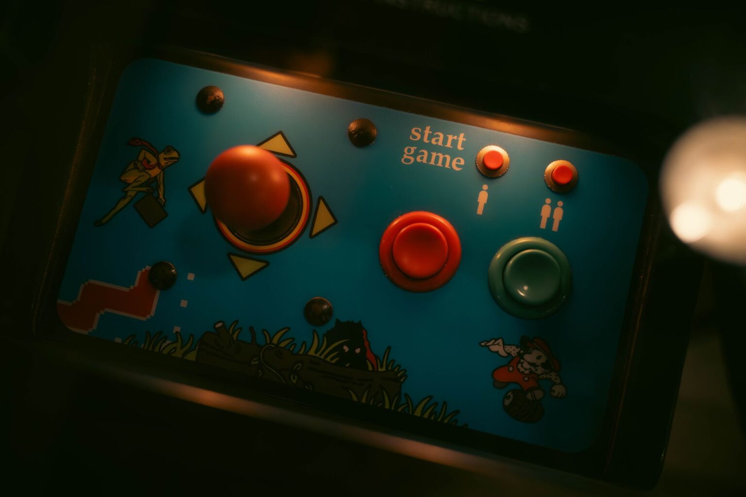 Street Fighter 6’s Year Three Slump Is Reviving Third Strike Lobbies Close-up of an arcade cabinet control panel with joystick and buttons