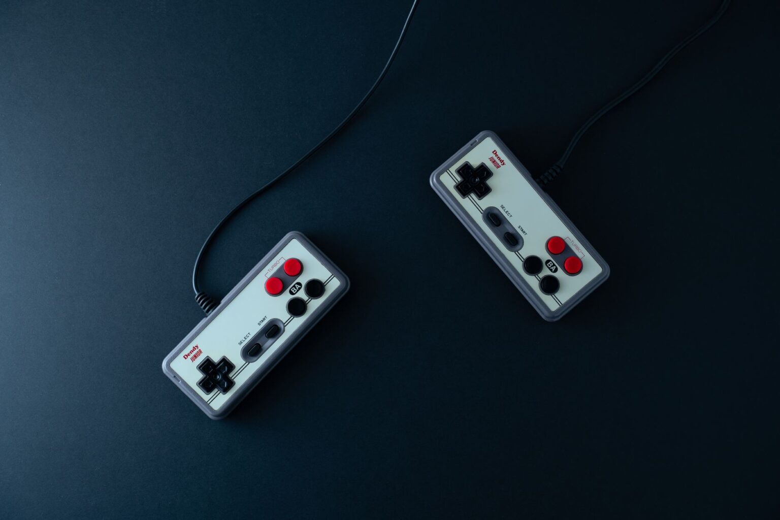 A gaming controller resting on a desk representing modern console gaming