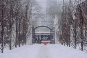 Sony’s Ghost of Yotei Silence Is Pulling Players Back to Tsushima A snow-covered mountain path with a traditional torii gate, evoking the setting of Ghost of Yotei