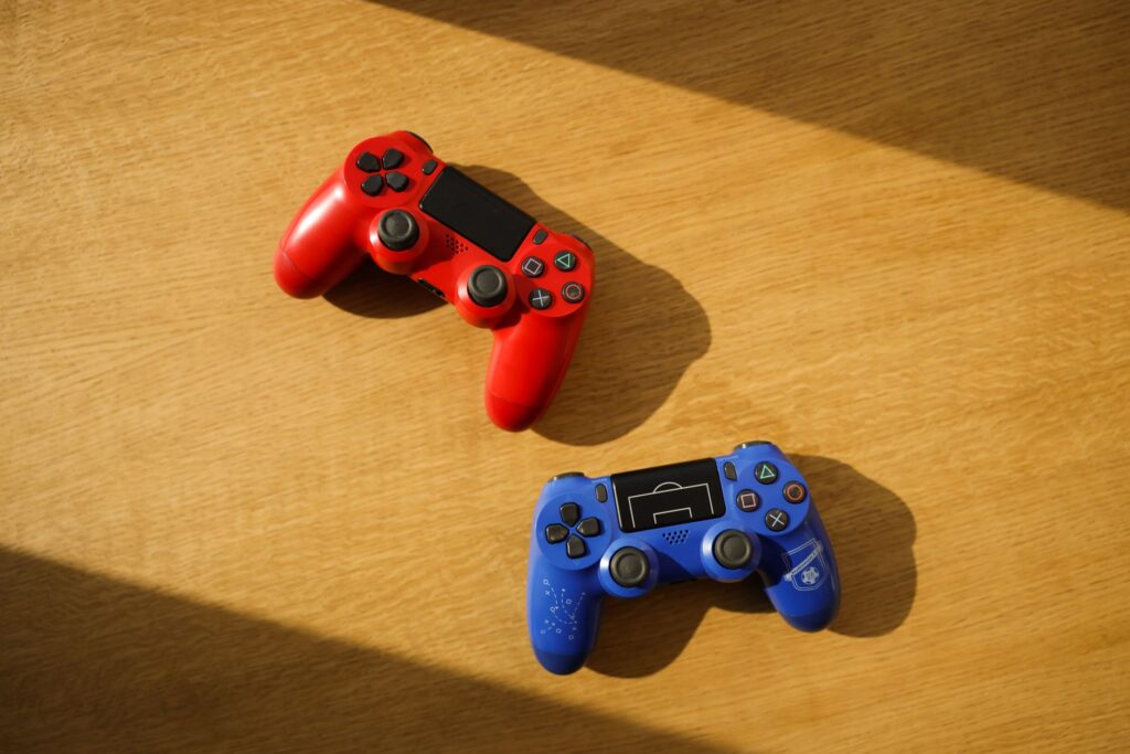 Bandai Namco’s Tekken 8 DLC Fatigue Is Reviving Tekken Tag 2 Lobbies A gaming controller resting on a desk, representing fighting game player frustration with DLC pricing