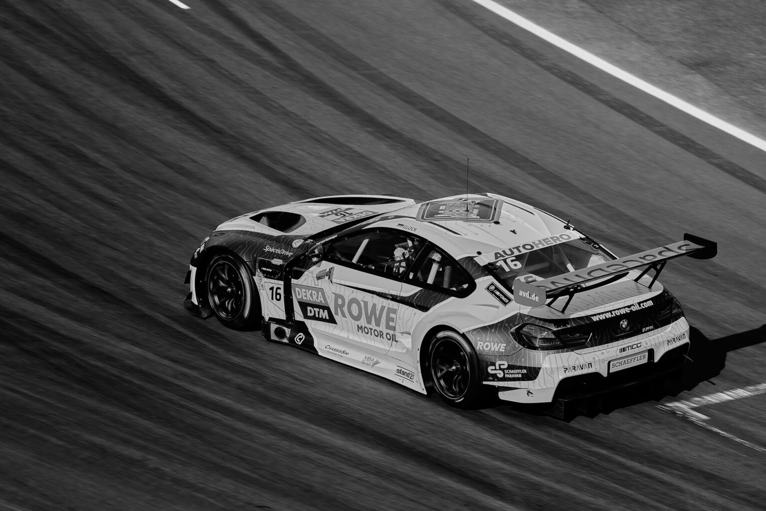 Bandai Namco’s Codemaster Acquisition Silence Is Stalling Grid Fans Racing car on a circuit track representing the Grid racing game franchise