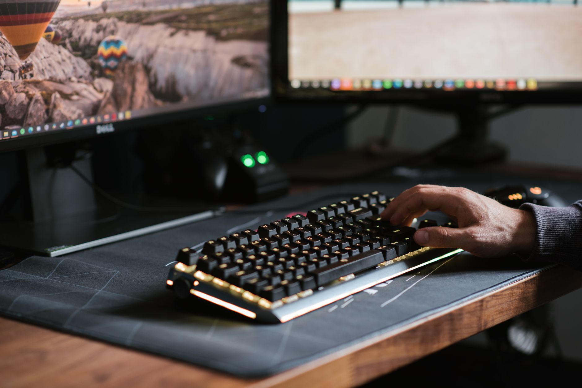 A game development studio environment with computers and concept art