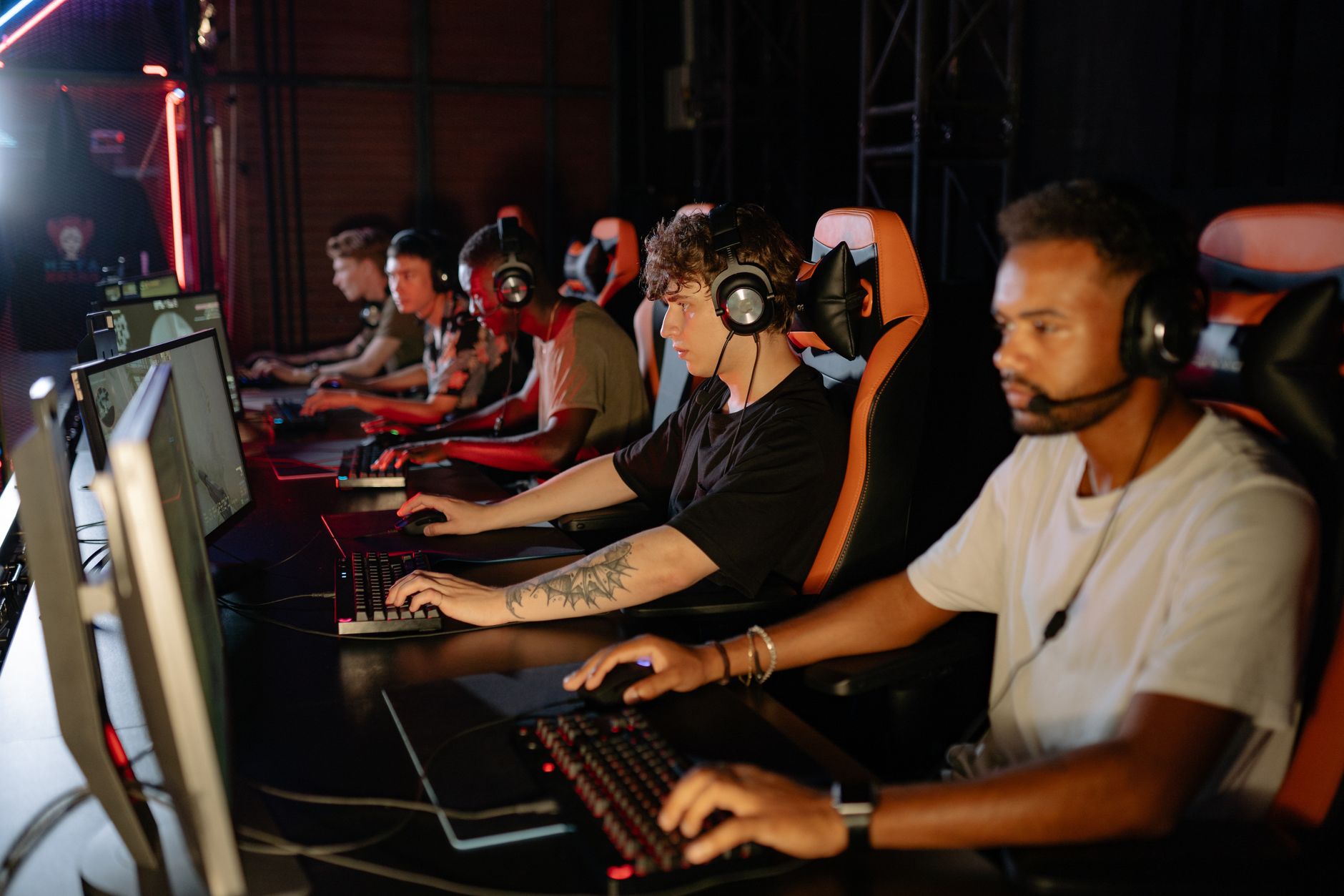 Esports arena with screens showing competitive gaming environment