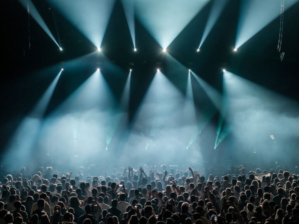 Epic’s Fortnite Festival Silence Is Sending Players Back to Rock Band 4 Colorful stage lighting at a live music concert venue
