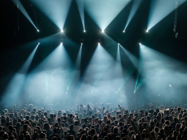 Epic’s Fortnite Festival Silence Is Sending Players Back to Rock Band 4 Colorful stage lighting at a live music concert venue