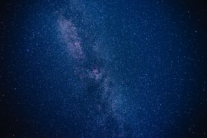 Bethesda’s Starfield DLC Silence Is Funneling Players Back to No Man’s Sky A vast galaxy viewed from space, representing the open-universe setting of space exploration games