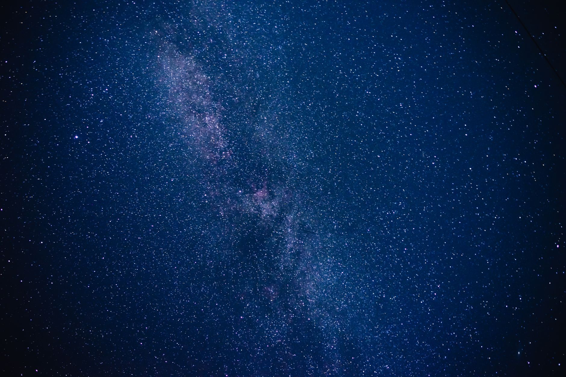 A vast galaxy viewed from space, representing the open-universe setting of space exploration games