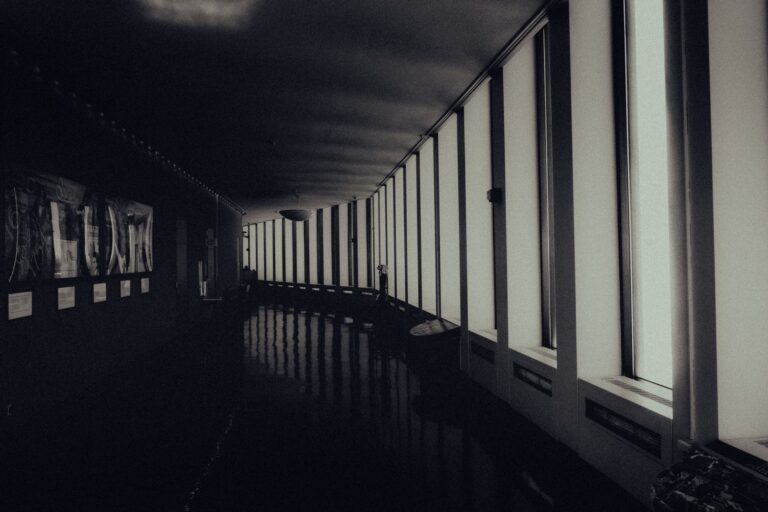 Konami’s Silent Hill 2 Remake Buzz Is Cooling Homecoming Runs A dimly lit, fog-filled hallway evoking the atmosphere of a horror game environment