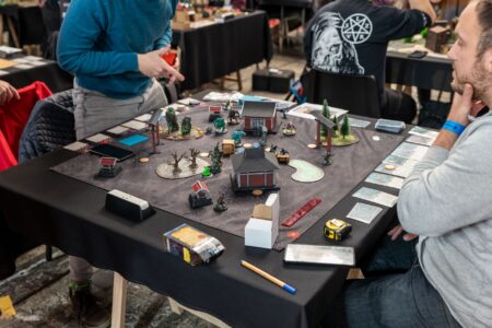 EA’s Dragon Age: The Veilguard Silence Is Reviving Origins Runs A gaming setup with a monitor displaying an RPG game, representing the Dragon Age franchise revival