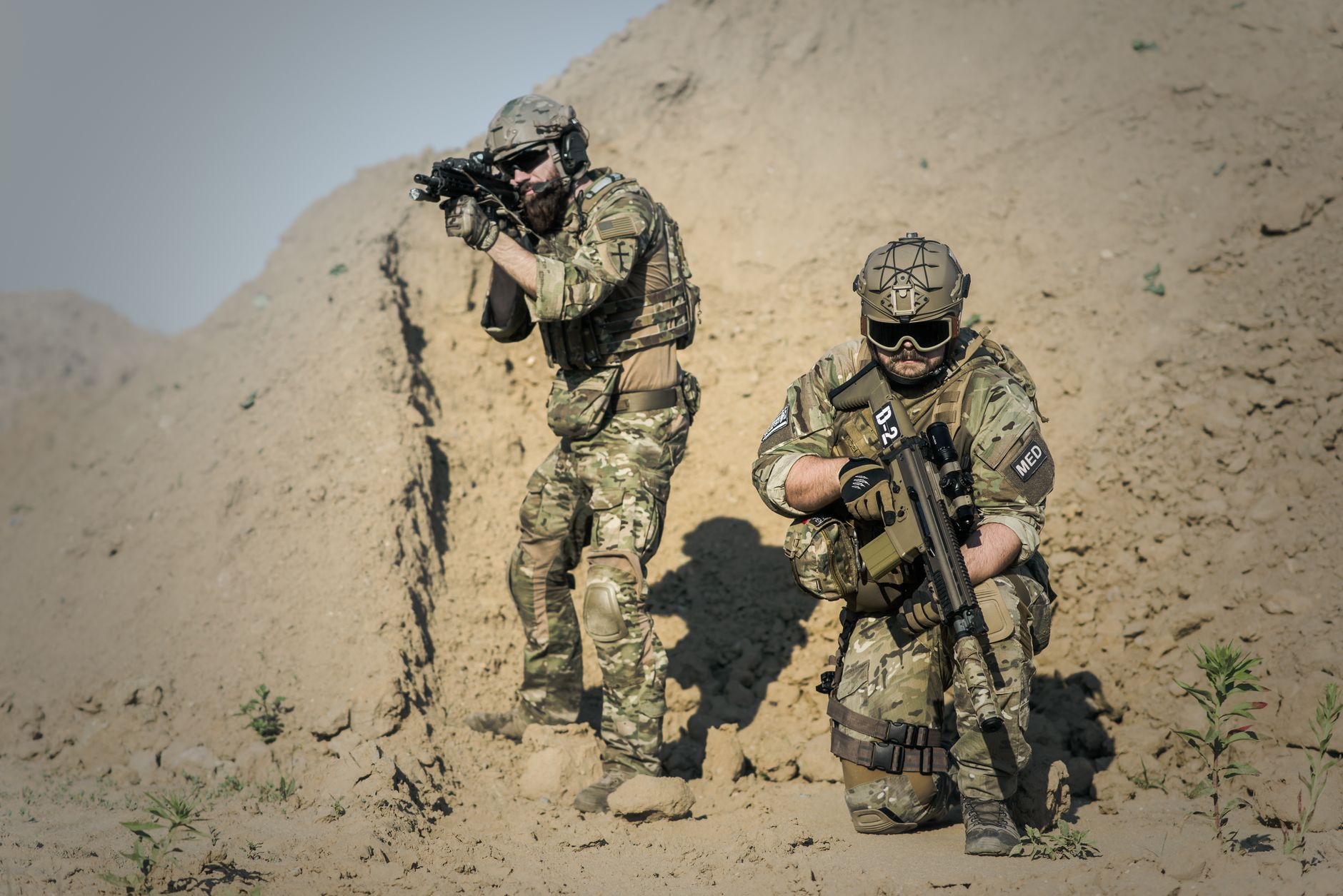 A figure in tactical military gear representing the extraction shooter game aesthetic