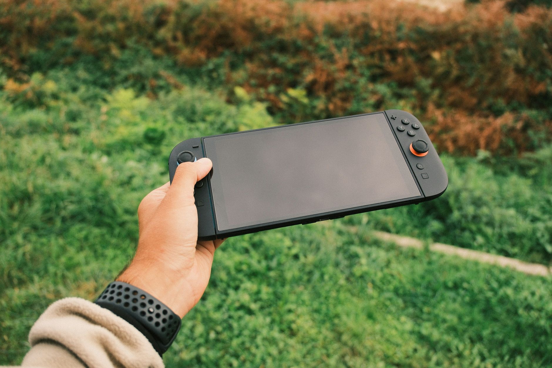 Nintendo Switch controller resting on a surface, symbolizing console gaming activity