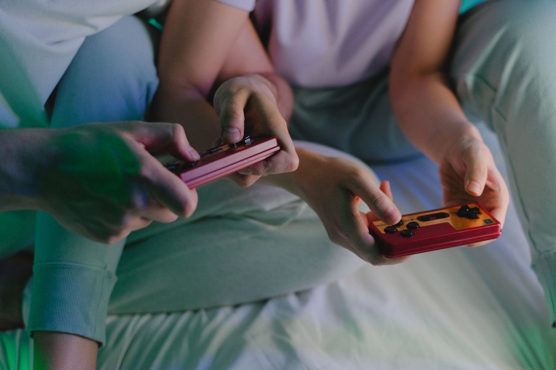 Players engaged in a cooperative gaming session on multiple screens