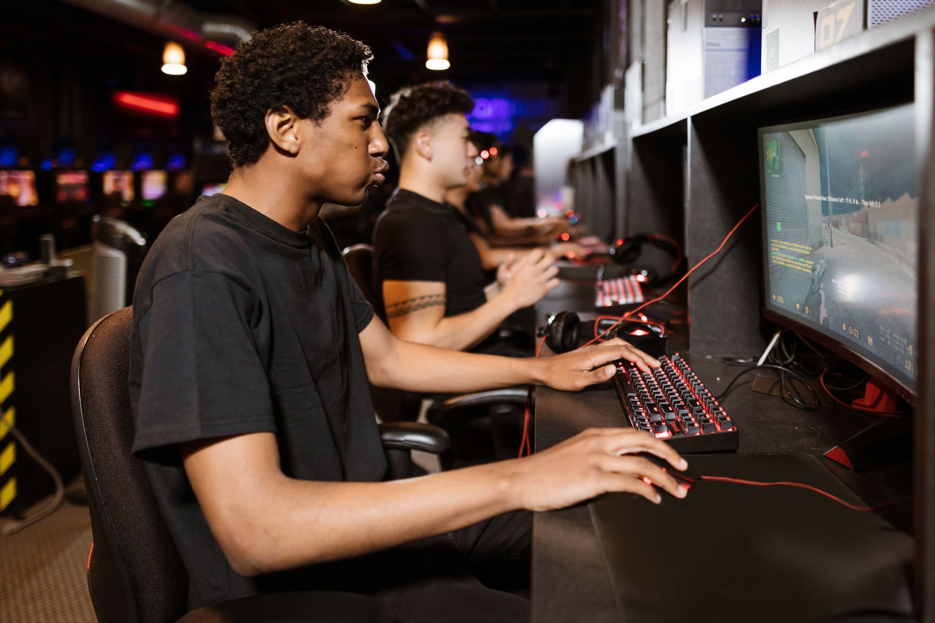 Person playing a video game on a console or PC setup