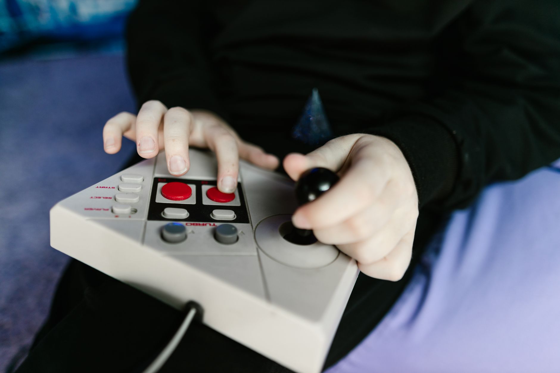 Close-up of a gaming controller resting on a surface