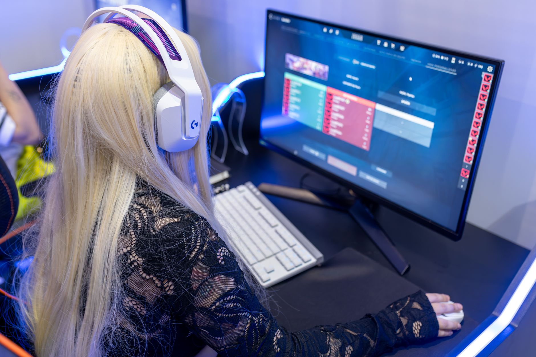 A gamer focused on a screen during an intense RPG session