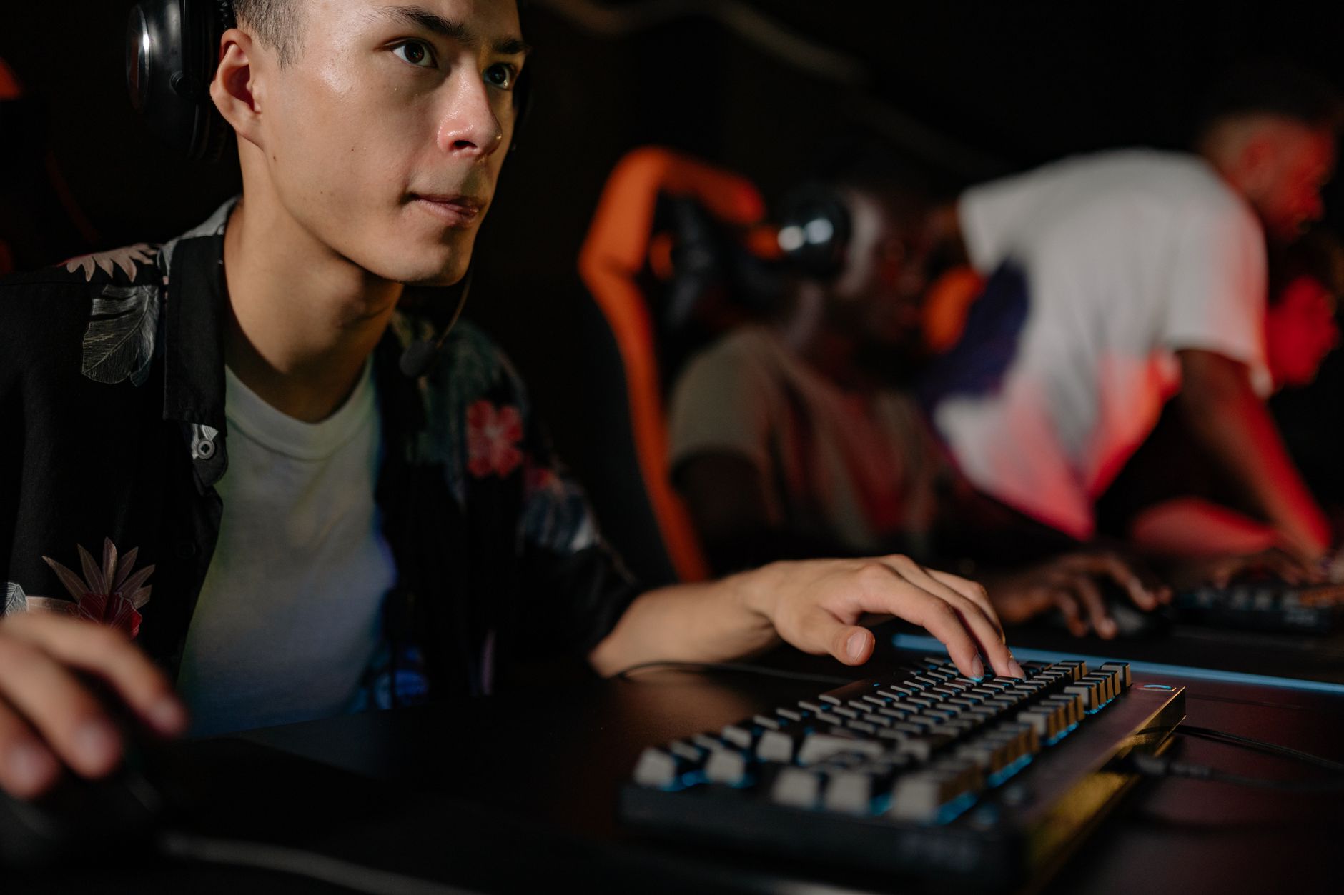 Player browsing an online gaming lobby on a monitor