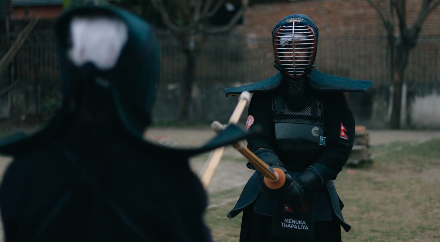 A samurai warrior in traditional armor, evoking the setting of Ghost of Tsushima
