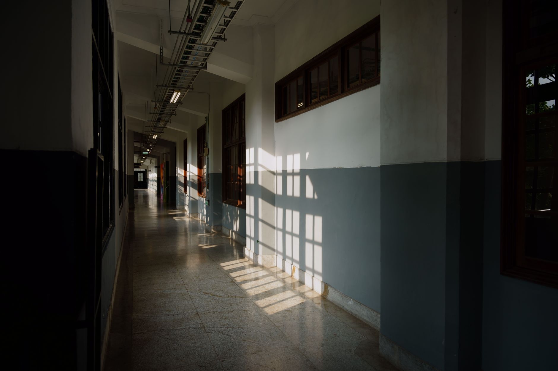 Empty school hallway with lockers, representing the Bullworth Academy setting from the Bully video game