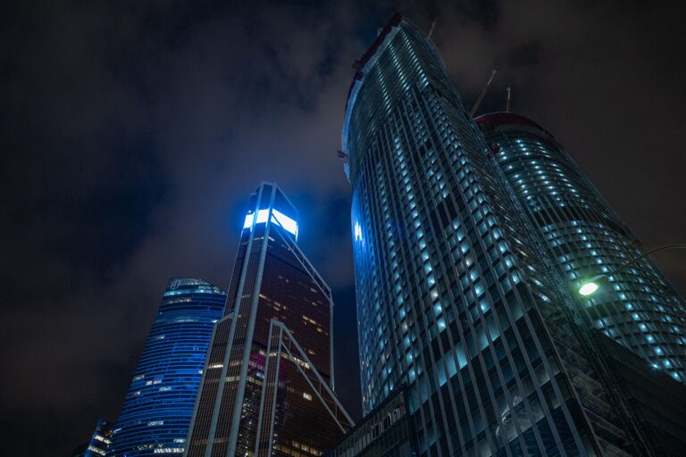 A dark futuristic city skyline representing the atmospheric setting of upcoming sci-fi games like Pragmata