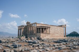 Ubisoft’s Assassin’s Creed Shadows DLC Silence Is Reviving Odyssey Runs Sunlit ancient Greek ruins representing the setting of Assassin's Creed Odyssey
