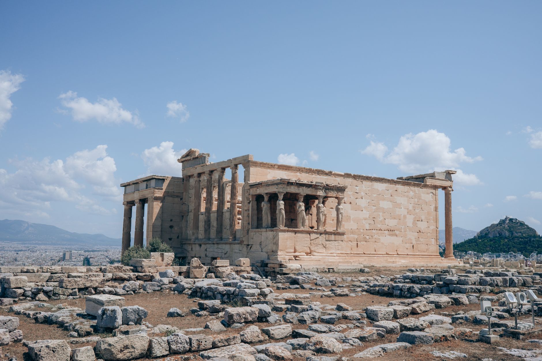 Sunlit ancient Greek ruins representing the setting of Assassin's Creed Odyssey