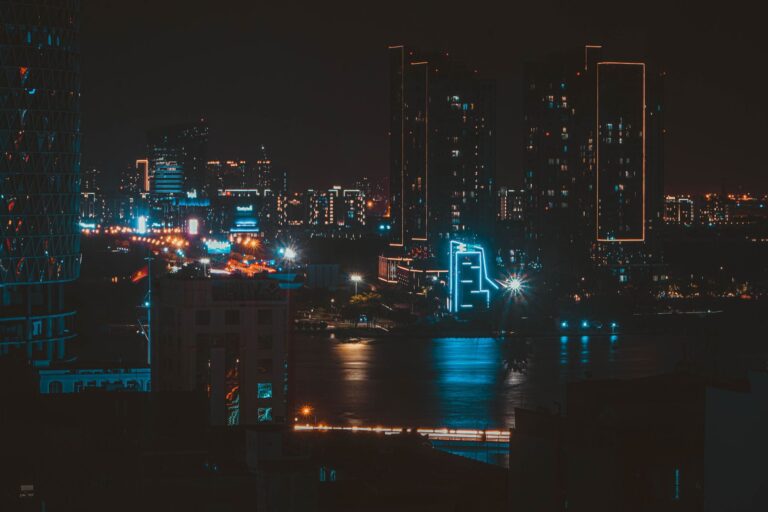 Neon-lit futuristic city street at night representing the cyberpunk aesthetic of Night City
