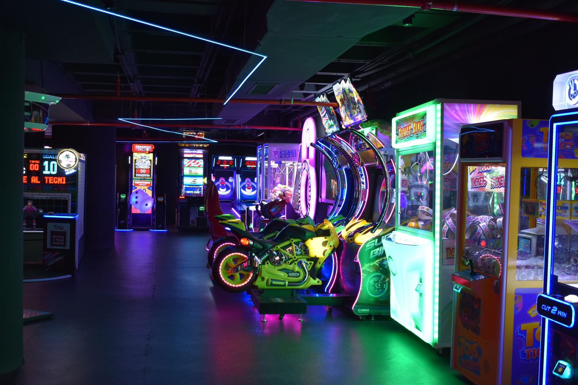 Neon-lit retro gaming setup evoking the visual style of 1980s action aesthetics