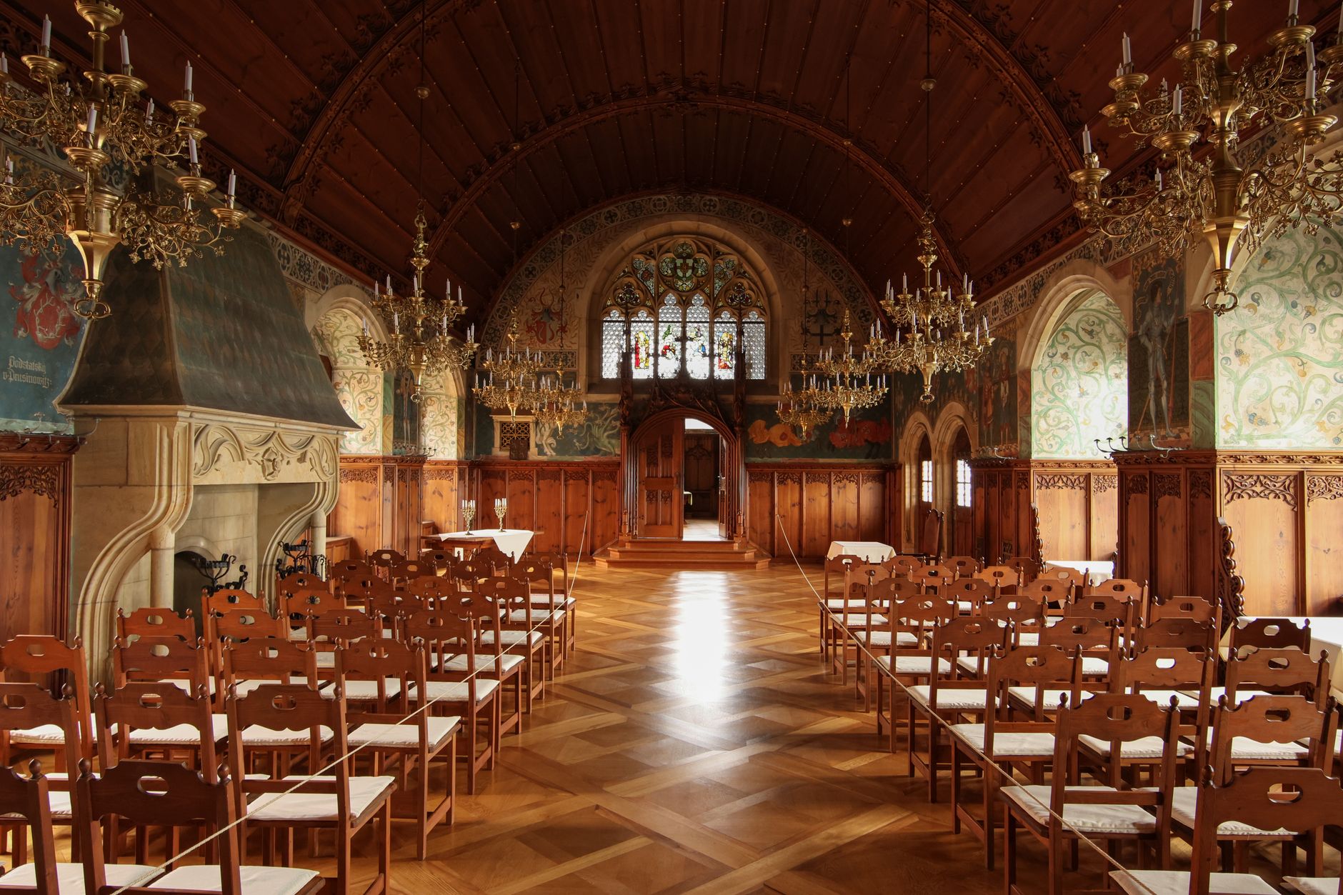 Dark gothic castle interior with stone arches and dramatic lighting