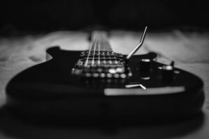 Neversoft’s Guitar Hero Silence Is Sending Fans Back to Warriors of Rock Close-up of an electric guitar, representing the Guitar Hero franchise's musical roots