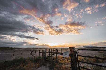 Rockstar’s GTA VI Delay Buzz Is Pulling Fans Back to RDR2 A sweeping golden-hour western landscape evoking the setting of Red Dead Redemption 2