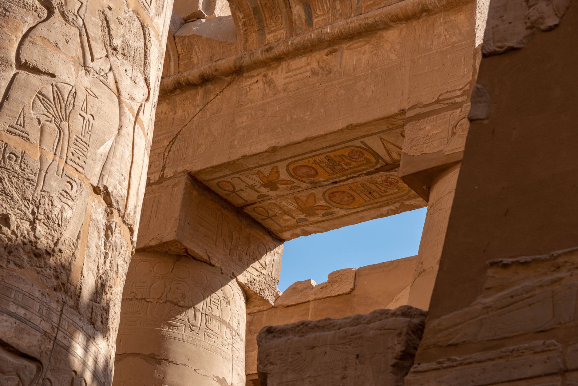 Ancient Egyptian ruins and desert landscape evoking the setting of Assassin's Creed Origins