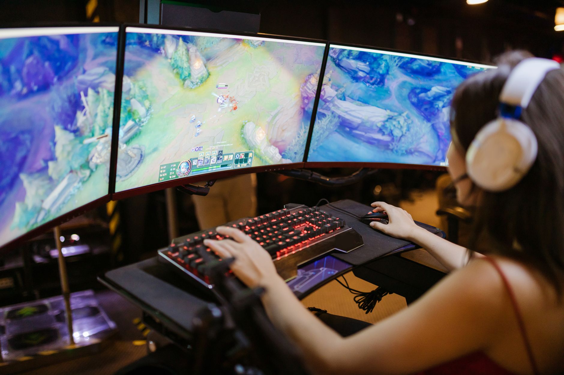 A gaming setup with multiple screens used for speedrunning and competitive play
